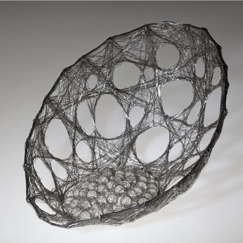 Cocoon, stainless steel fine wire stress skin form with glass spheres by Ema Tanigaki